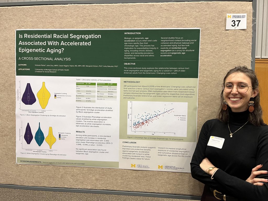 Victoria Fisher and her poster on residential racial segregation and accelerated epigenetic aging